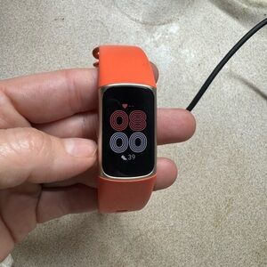 Fitbit 6 Smartwatch with Orange Band